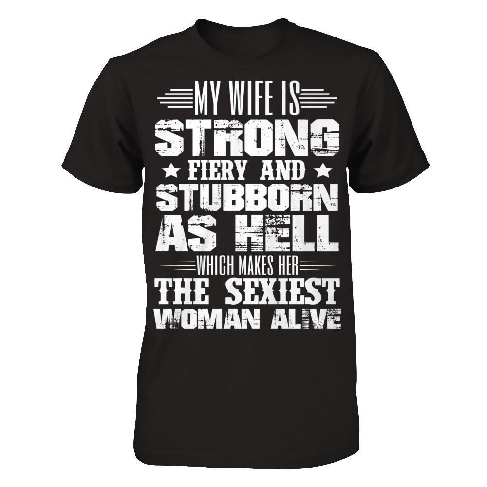 My Wife Is Strong, Fiery And Stubborn As Hell Which Make Her The Sexiest Woman Alive Gildan - Short Sleeve Tee Black