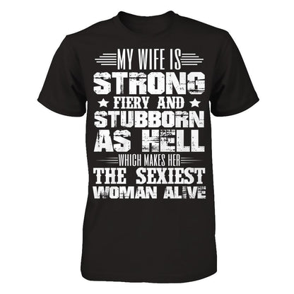My Wife Is Strong, Fiery And Stubborn As Hell Which Make Her The Sexiest Woman Alive Gildan - Short Sleeve Tee Black