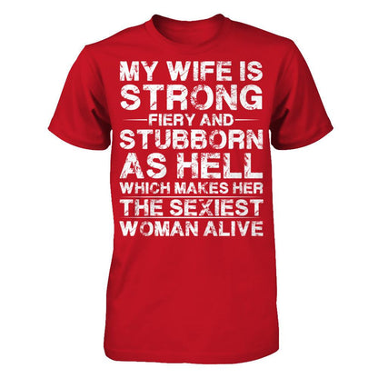 My Wife Is Strong, Fiery And Stubborn As Hell Which Make Her The Sexiest Woman Alive Gildan - Short Sleeve Tee Red