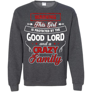 Warning This Girl Is Protected By The Good Lord And A Crazy FamilyG180 Gildan Crewneck Pullover Sweatshirt 8 oz.