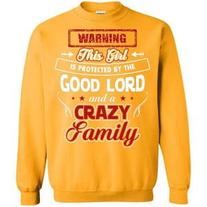 Warning This Girl Is Protected By The Good Lord And A Crazy FamilyG180 Gildan Crewneck Pullover Sweatshirt 8 oz.