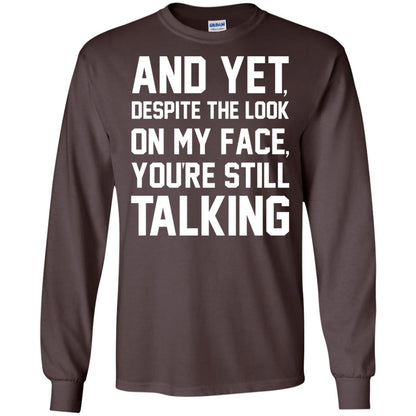 And Yet Despite The Look On My Face You're Still Talking T-shirt Dark Chocolate